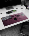 Winged shinigami silhouette centered with splatter lines on Death Note anime mouse pad 32x16 inches.