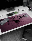 Winged shinigami silhouette over smoky purple Death Note anime desk pad 40x20 inches, ink drip logo.