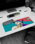 32x12 inches mouse pad featuring a mint-haired anime girl in a tiny hat, playful wink, and floating dots.