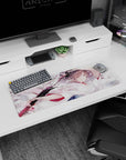 Katana-wielding anime girl amid floating cherry blossoms on extended mouse pad 32x12 inches.