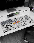 36x16 inches Naruto desk pad featuring Naruto, Sasuke, Sakura, and Kakashi hidden in manga panels.