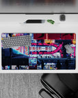 32x16 inches mouse pad with Neon Sakura Nights, capturing the serene beauty of cherry blossoms against a vibrant neon-lit cityscape.