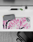 Compact 28x12 desk mat highlights cherry blossoms and tranquility for immersive peaceful vibes