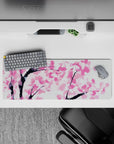 Intense 32x12 desk mat features sakura petals with intricate details for fans of serene artistry