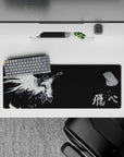 32x12 inches anime mouse pad in stark black and white, dramatic and haunting for calm late-night focus.