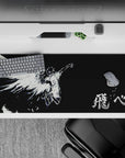 36x16 inches black anime desk pad with stark white angel line art, dramatic and haunting late-night vibe.