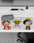 Playful yet tough 32x12 mouse pad features Luffy's iconic styles for One Piece enthusiasts