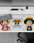 Striking 36x16 desk pad highlights Luffy's evolution with classic and tough sides for fan admiration