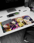 Workspace-ready 36x16 inch desk pad with vibrant art of Tanjiro, Nezuko, Zenitsu, and Inosuke for fans
