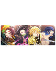 32x12 inch mouse pad featuring Tanjiro, Nezuko, Zenitsu, and Inosuke with bold elemental designs