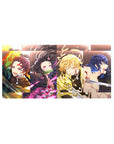 32x16 inch mouse pad featuring Tanjiro, Nezuko, Zenitsu, and Inosuke in intense combat scenes