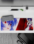 Elegant 32x12 mouse pad with Rei Ayanami’s resolute stance, fiery reds, icy blues, and contrasting red eyes for striking design