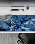 Striking 36x16 desk pad highlights the clash of vibrant auras, intricate warrior details, and explosive energy in stunning visual contrast