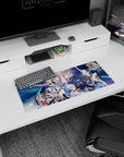 28x12 inches anime girl mouse pad featuring silver-haired heroine, pink cape queen, and black-armored fighter.