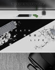 40x20 inches desk pad with Duality Blossom, blending delicate cherry blossoms with stark black-and-white contrasts, representing the eternal cycle of life and death.