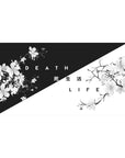 Desk pad featuring Duality Blossom, 40x20 inches, with cherry blossoms intertwined in bold black-and-white tones, symbolizing life and death.
