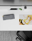 Bright warm anime mouse pad 14x10 inches in golden yellow, black stripes and soft purple eyes on white.