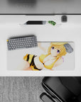 28x12 inches anime desk mouse pad with warm purple-eyed smile, bright crisp print, clean white and yellow tones.