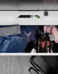 Striking 36x16 desk pad highlights the powerful dark knight, intricate glowing outlines, and cosmic details in stunning visual contrast