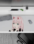 Striking 36x16 mouse pad highlights Zero Two’s fanged grin, radiant teal eyes, and clean lines in stunning visual simplicity