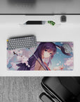 28x12 inches pastel spring romance mouse pad, soft pink sakura, rainy gloss highlights, dreamy vibe.