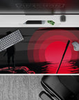 40x20 inches anime desk pad in smoky blacks and deep grays with a deep red glow, moody minimal style.
