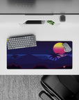 Compact 28x12 desk mat highlights tropical sunset and deep blue hills for immersive calming vibes