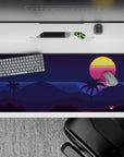 Striking 36x16 desk pad highlights smooth palm silhouettes and neon glow with intricate sunset details