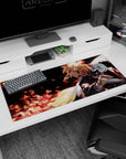 Artistic 36x16 inches desk pad featuring Kyōjurō Rengoku and his powerful flame techniques, perfect for fans who admire strength and resolve.
