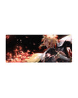 Mouse pad featuring Kyōjurō Rengoku, 28x12 inches, with vibrant flames and unyielding determination, perfect for your workspace.
