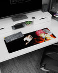 32x12 inches Fairy Tail mouse pad showing Natsu Dragneel with pink spiky hair and battle marks amid flames.