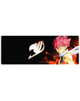 32x12 inches anime mouse pad featuring Natsu with flame bursts, white scarf, and bold icon on black space.