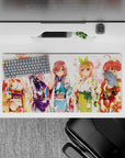 32x16 inches anime girl mouse pad in soft creamy light with pink petals, violet, sky blue, green and red.