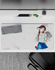 32x16 inches kawaii desk mat in airy white with pastel confetti, warm chestnut hair, bright summer feel.