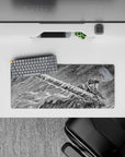 Compact yet detailed 28x12 inch mouse pad with Guts in raw sketch-style art for manga lovers
