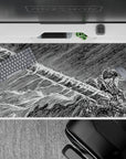 Dynamic 40x20 inch anime desk pad showcasing Guts in raw sketch-style art for Berserk manga fans