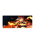Mouse pad featuring a determined fighter, 28x12 inches, surrounded by fiery energy and intense flames, perfect for fans of battle visuals.
