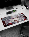 Silver-haired anime demon girl smirking on a 32x16 inches mouse pad, big ribbons and intense pink eyes.