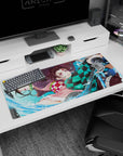 Workspace-ready 36x16 inch desk pad with Tanjiro and Nezuko's vibrant energy, ideal for fans of the series