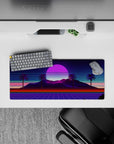 28x12 inches mouse pad with Neon Oasis Dusk, showcasing a serene sunset with vibrant hues of violet and pink, blending nature and technology.