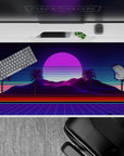 40x20 inches desk pad with Neon Oasis Dusk, showcasing palm trees against a serene, retro-futuristic sunset in vibrant violet and pink tones.