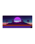 Mouse pad featuring Neon Oasis Dusk, 28x12 inches, with silhouetted palm trees against a vibrant retro-futuristic sunset in violet and pink.