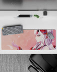 32x12 inches anime girl mouse pad in warm reds and creamy whites, soft pink petals, cozy dreamy desk vibe.