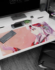 Smiling anime shrine maiden with fox ears and flowing hair amid drifting petals on 40x20 inches desk pad.
