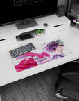 Anime girl in a breezy cherry blossom scene mouse pad 28x12 inches, glossy pink ribbon flowing behind.