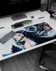 Large 40x20 inches desk pad with Nezuko Kamado, featuring a serene moonlit scene where gentle wind lifts her hair, perfect for Demon Slayer fans.