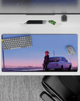 32x16 inches anime desk mat in blue-to-peach sunset gradients, cozy solitude, wet pavement reflections.