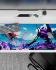 Explosive 36x16 desk pad showcasing Unit-01 in battle against a fearsome Angel, with neon purples, electric greens, and fiery reds for action fans