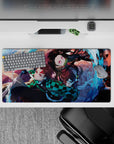 High-quality 32x16 inch mouse pad showcasing Tanjiro and Nezuko's relentless energy for gaming setups