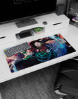 Durable 32x16 inch mouse pad with dynamic water and flame design, bringing Demon Slayer to your desk